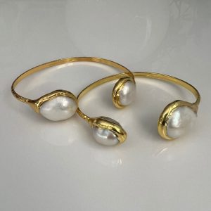 Bella gold cuff bracelets with pearl ends